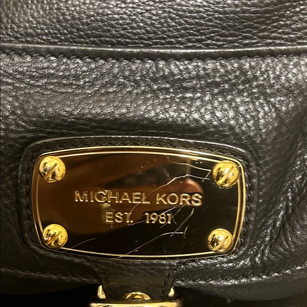 Michael Kors Black Hobo Bag with Gold Accents